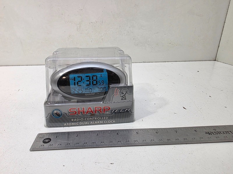 BRAND NEW Sharp Tech Digital Radio Controlled Atomic Alarm Clock SPC354