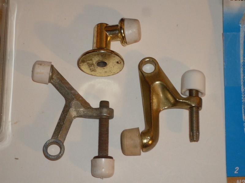 Assorted Door Stoppers. Mount on floor, wall, baseboard or hinge pin. 9 total gallery