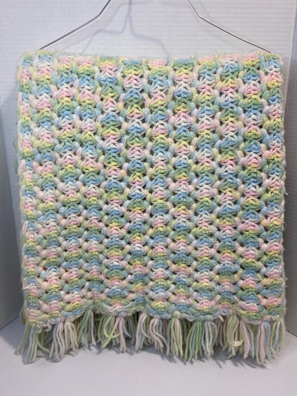 Afghan made with Baby Colors (blue, pink, yellow, white) 49″ long x 30″ wide