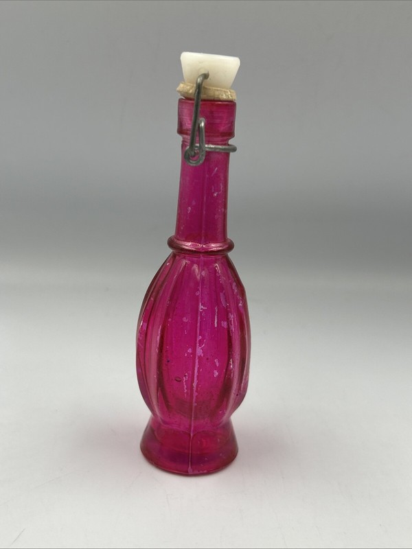 Set Of 2 Colored Glass Bottles With Ceramic Stoppers. 5 " Tall. Pink And Blue gallery