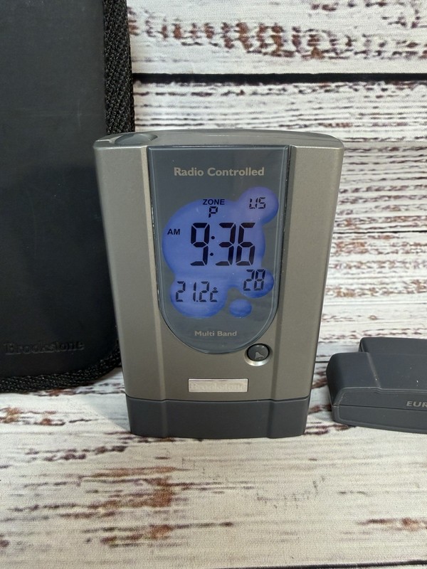 Brookstone Radio Controlled World Travel Alarm Clock w/Case & Cartridges gallery