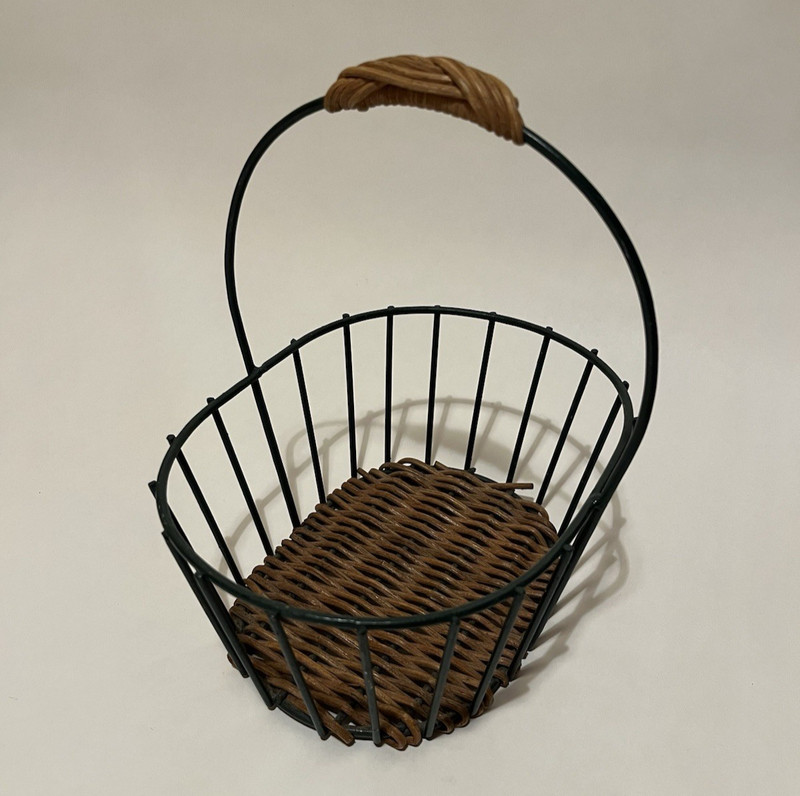 Green metal and brown wicker basket with handle rustic farmhouse decor