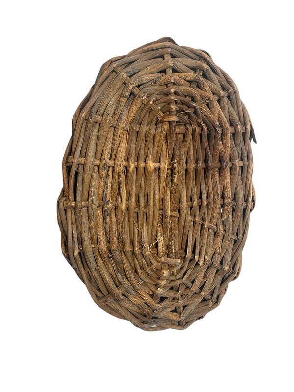 Rustic Hand Woven Basket Made From Natural Materials In An Oval Shape gallery