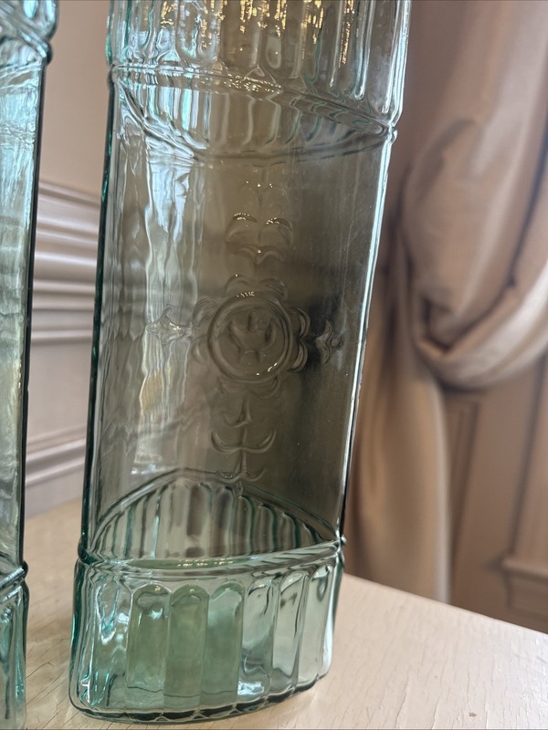 Two Turquoise 3-sided Storage Jars Embossed Design Glass 11.5" gallery