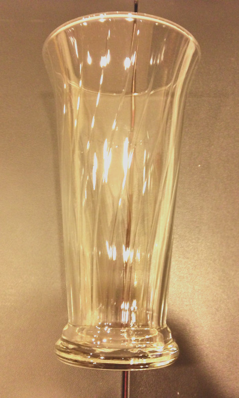 10-1/2″ tall Clear crystal with curving vertical lines from bottom to top. New