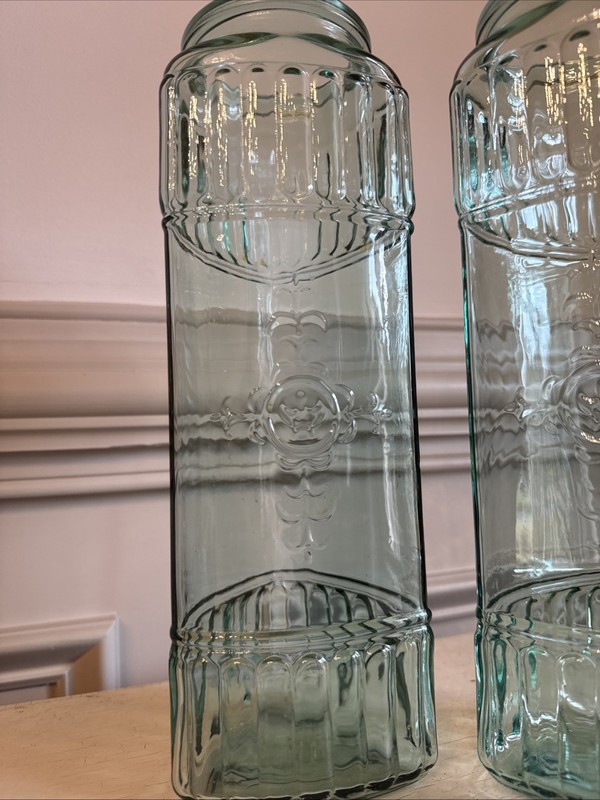 Two Turquoise 3-sided Storage Jars Embossed Design Glass 11.5" gallery