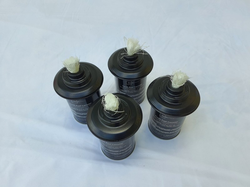 4 Garden torch fluid containers . 12fl.oz.  $18.99