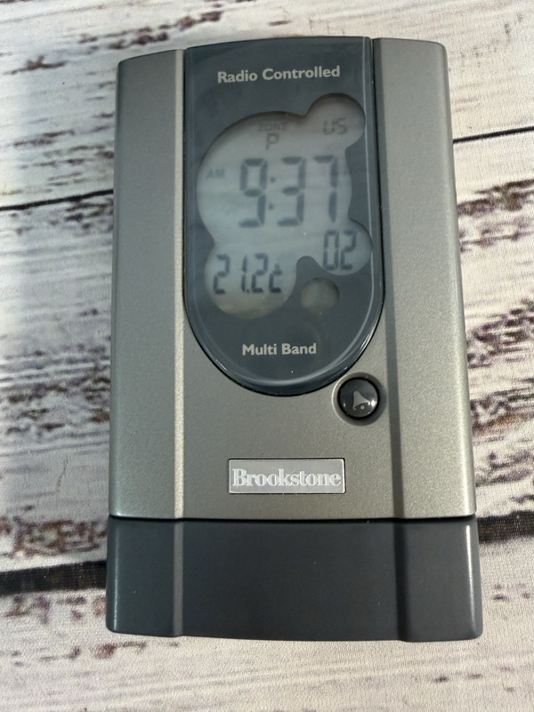 Brookstone Radio Controlled World Travel Alarm Clock w/Case & Cartridges gallery