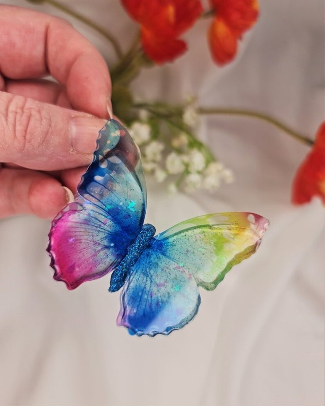 Transparent multicoloured 3D butterfly with iridescent sparkles for... gallery