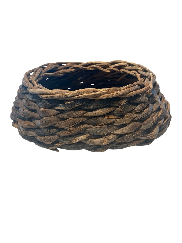 Rustic Hand Woven Basket Made From Natural Materials In An Oval Shape gallery