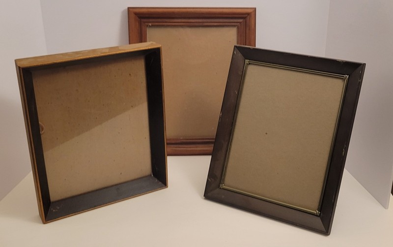 Three heavy wooden picture frames.  Various styles, see photos. 