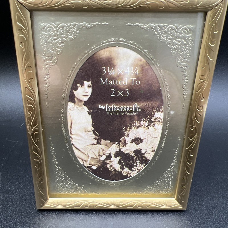 Intercraft 3 1/4” x 4 1/4” picture frame matted 2”x 3” inches Gold Toned Design