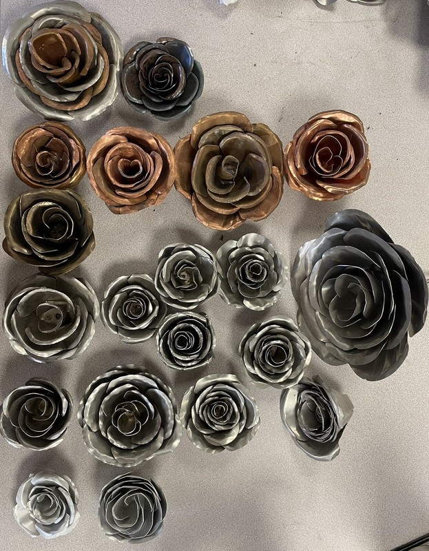Metal Rose Flowers, handcrafted, bent, and welded. $15/Rose.
