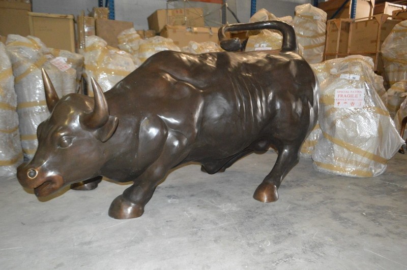 Wall Street Bull - Giant Bronze Statue - Size: 30"L x 82"W x 47"H. gallery