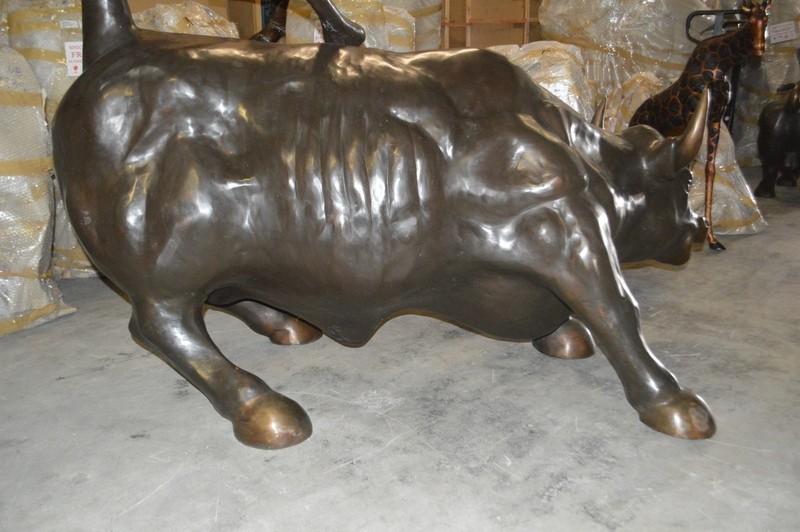 Wall Street Bull - Giant Bronze Statue - Size: 30"L x 82"W x 47"H. gallery